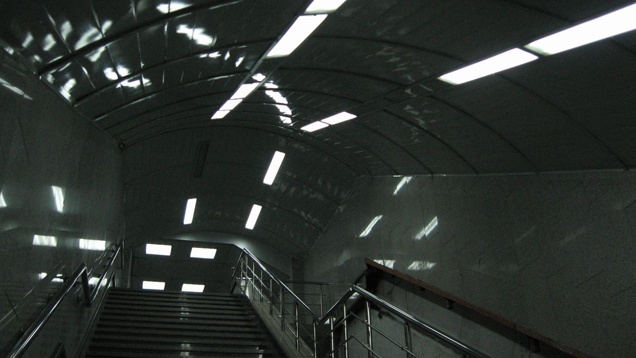 Linear lights along a curved ceiling